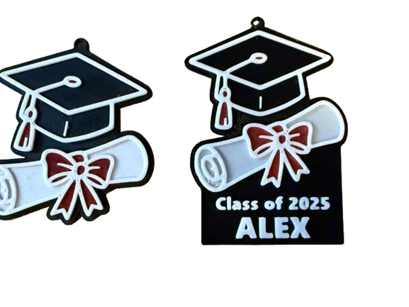 Graduation-themed decorative item with 'Class of 2025 ALEX' text on a white background